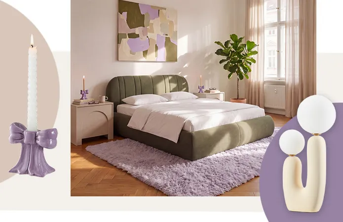 Olivefarbenes Bett, kaschmirfarbener Nachttisch mit lila Schleifen-Kerzenständer und weißer Stabkerze, Tischlampe in Creme mit zwei runden Leuchten