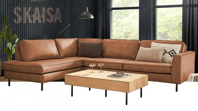 Skaisa, braunes Eckledersofa mit schlanken, schwarzen Füßen