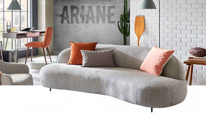 Ariane, graues Sofa in organischer Form mit abgerundeter Rückenlehne