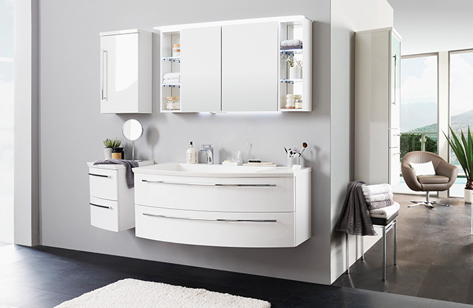 Moderne, weiße Badmöbel, Waschtischunterschrank in halbrunder Form