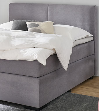 Graues Boxspringbett