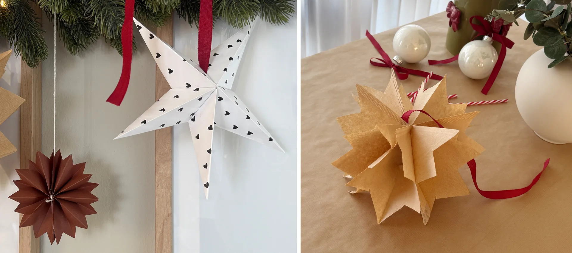 Drei verschiedene Weihnachstssterne hängend an Tannengirlande