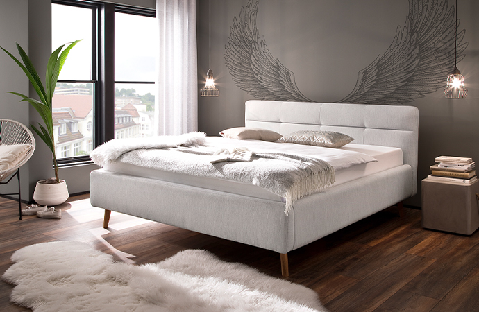 Polsterbett in Hellgrau
