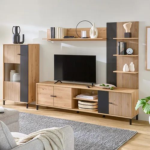 Wohnwand der Serie Calvas in Holzdekor mit Lamellen-Optik