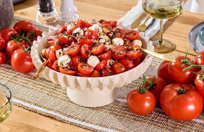 Zum Rezept Tomatensalat mit Mini-Mozzarella