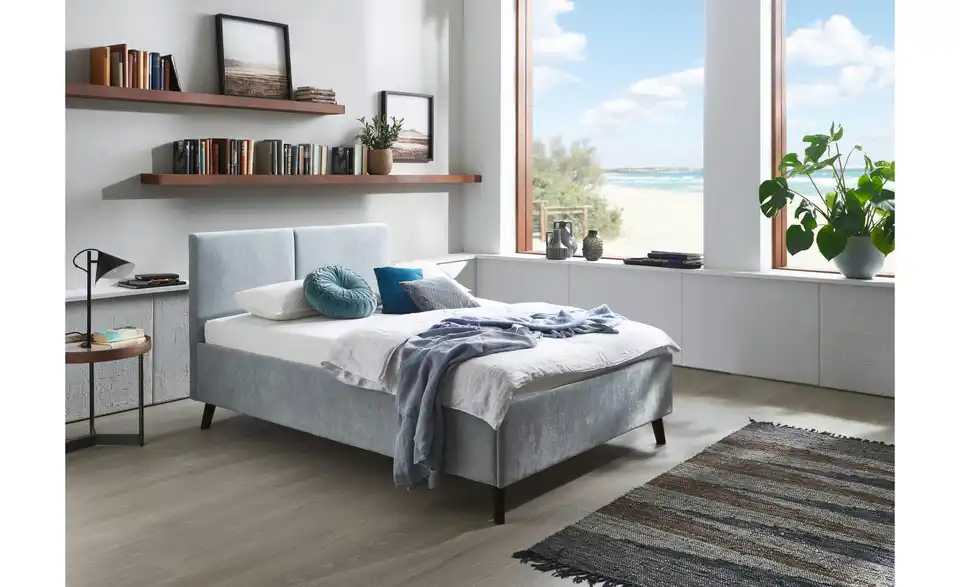 Polsterbett Piano in hellblau, in Wohnsituation