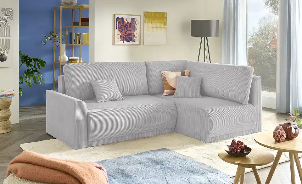 Ecksofa Malyn mit Schlaffunktion, in Wohnsituation