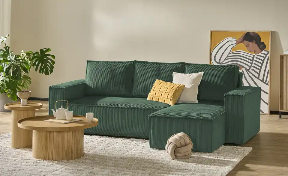 Ecksofa Xabia mit Schlaffunktion, in Wohnsituation