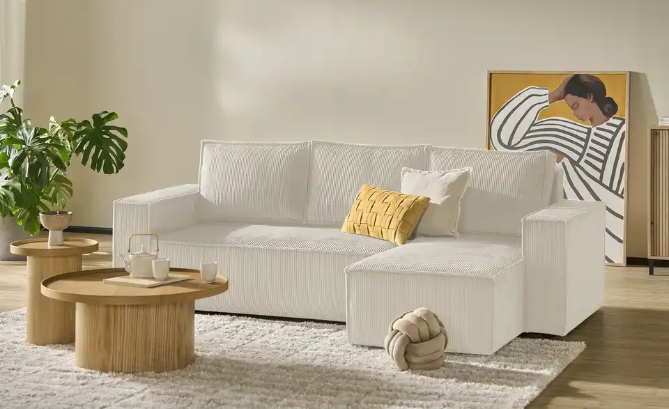 Ecksofa Xabia mit Schlaffunktion, in Wohnsituation