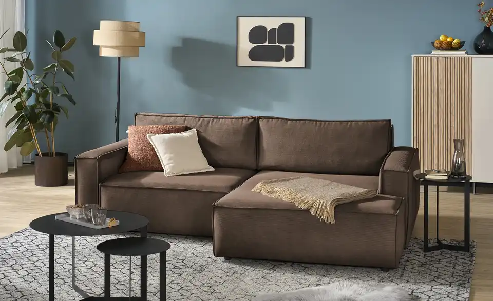 Ecksofa Capri mit Schlaffunktion, in Wohnsituation