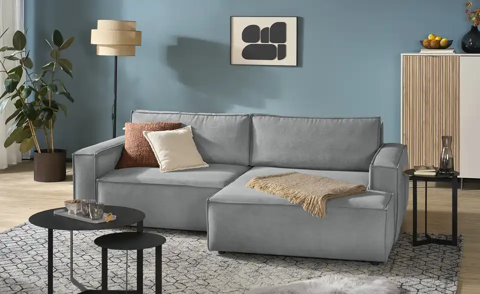 Ecksofa Capri mit Schlaffunktion, in Wohnsituation