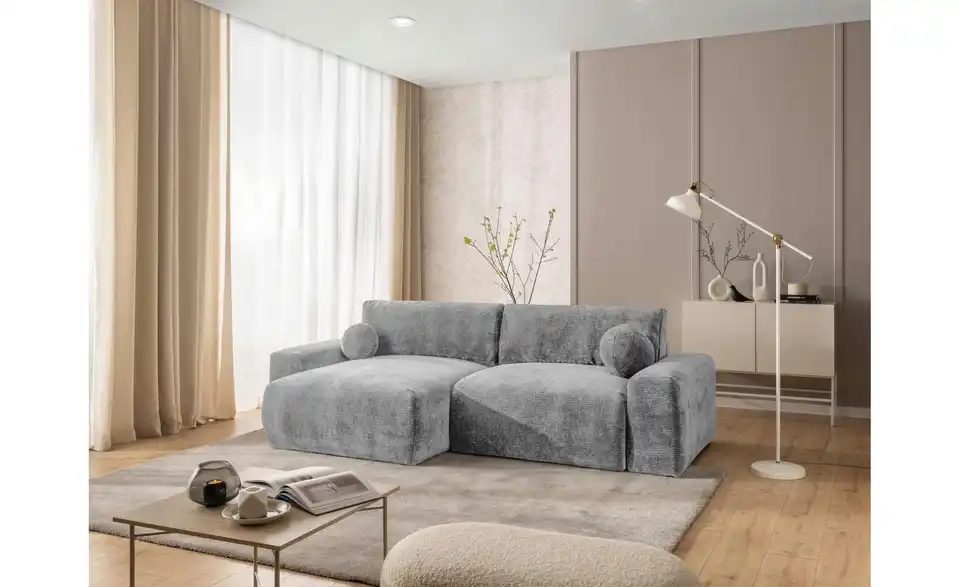 S-STYLE Ecksofa Puffy mit Schlaffunktion, in Wohnsituation