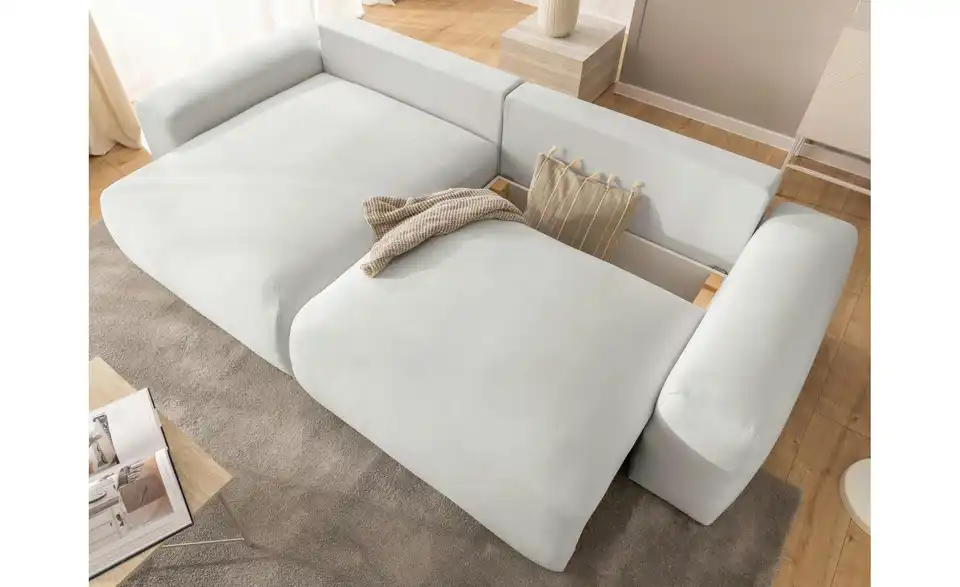 S-STYLE Ecksofa Puffy mit Schlaffunktion, in Wohnsituation