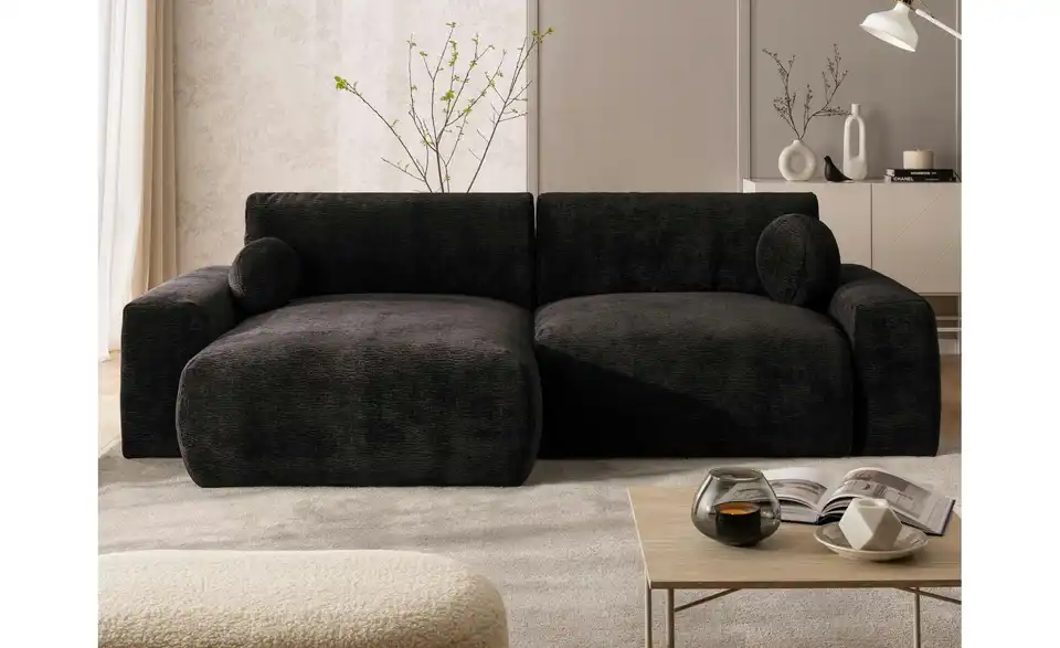 S-STYLE Ecksofa Puffy mit Schlaffunktion, in Wohnsituation