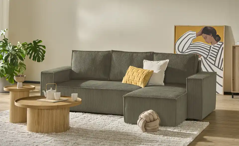 Ecksofa Xabia mit Schlaffunktion, in Wohnsituation