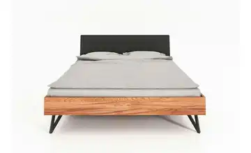  Massivholzbett mit gepolstertem Kopfteil Karl