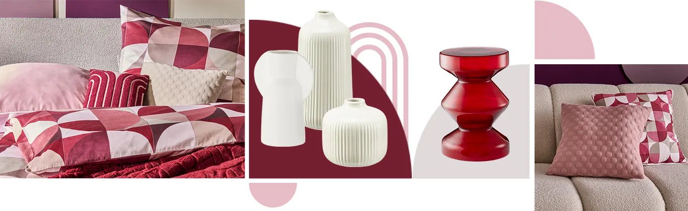 Gemusterte Bettwäsche in Beeren- und Rosatönen mit Kreisen, gepunktete Kissen in Creme und Rosa, roter Beistelltisch in rund, ovale Vasen in Steinoptik und Riffelung