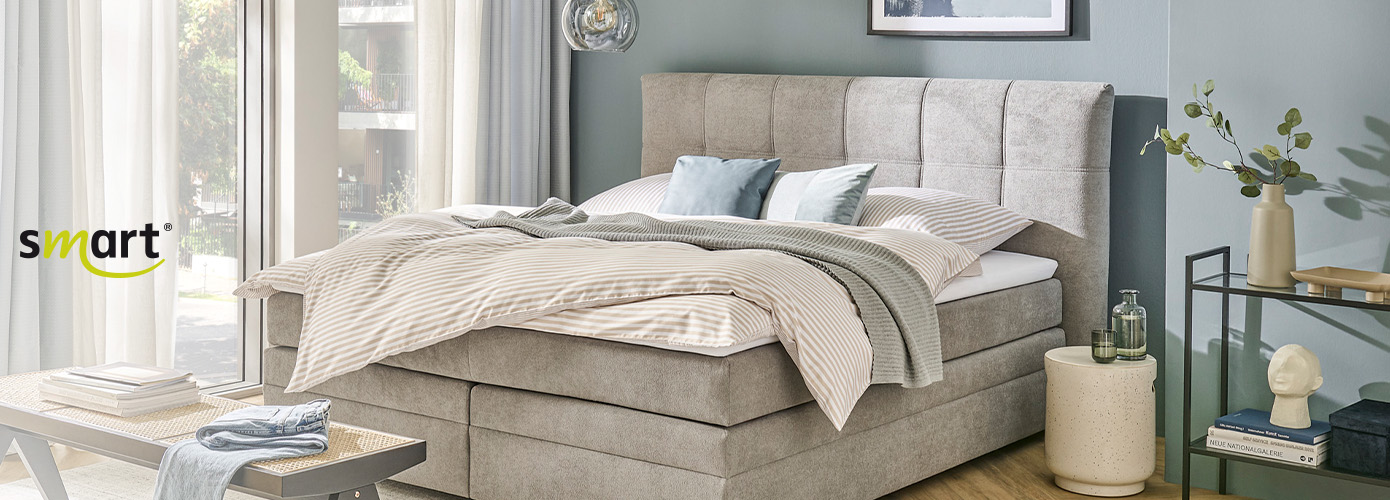 smart , Schlafzimmer mit Boxbett in Hellgrau